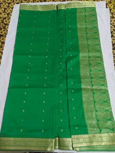 Vibrant Green Silk Saree with Golden Border