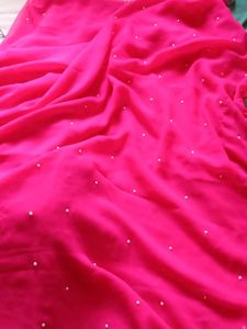 Vibrant Pink Saree with Pearl Embellishments