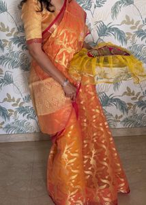 Elegant Orange Saree with Gold Motifs