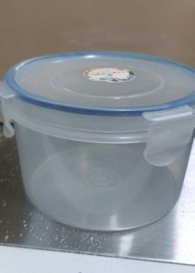 four Plastic Food Containers