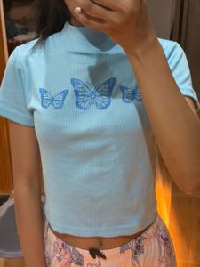 the pretty blue tops with butterfly