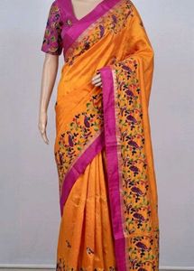 Vibrant Orange Saree with Peacock Embroidery