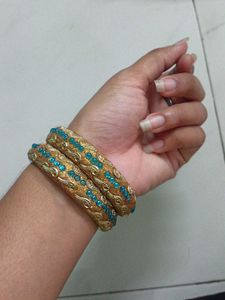 Exquisite Golden Bangles with Blue Stones