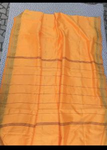 Vibrant Yellow Cotton Saree with Ornate Border