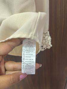 Elegant Cream Blouse with Lace Detail