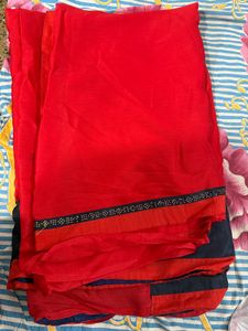 Stunning Red Saree with Peacock Embellishments
