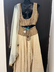 Off white Lengha Choli With Golden Shimmer Blouse