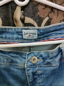 Light Blue Distressed Denim Jeans