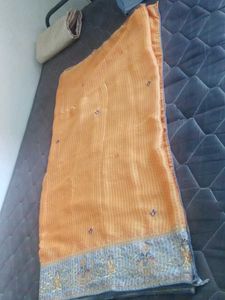 Beautiful Orange Saree with Embellished Border
