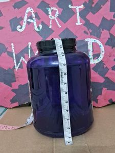 Large Empty Blue Protein Container