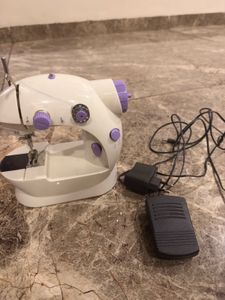 SKU MINI SWEING MACHINE