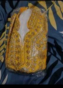 Embroidered Yellow Lehenga Choli Top