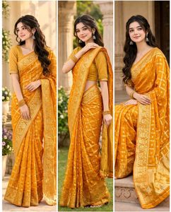 Elegant yellow Saree with Gold Details