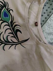 Elegant Peach Kurta with Peacock Design