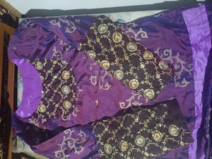 Stunning Purple Kurta Set with Gold Embellishments