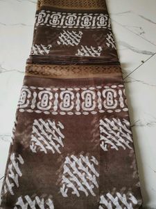 Brown Printed Saree with Gold Border