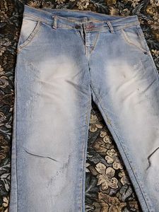 Light Wash Distressed Denim Jeans