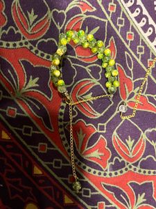 Green &amp; Yellow Beaded marble coloured Bracelet