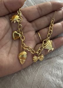 Charming Gold Tone Charm Bracelet