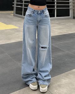 washed out distressed Blue baggy Jeans