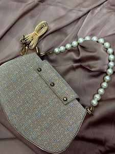 Shimmery Handbag with pearl chain