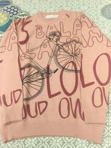 Peach Sweater with Bike Design