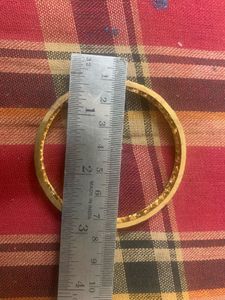 Elegant Gold Tone Bangles with Stone Accents