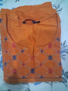 Elegant Rust Orange Kurta with Subtle Embroidery