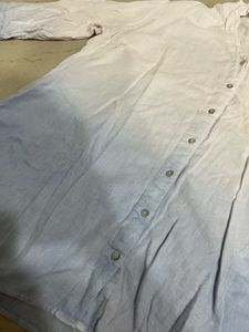 blue and white shirt with short sleeves