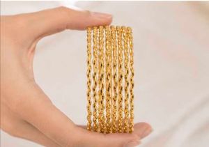 Elegant Gold Plated Twisted Bangles