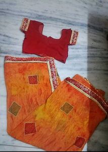 Vibrant Orange Saree with Geometric Print