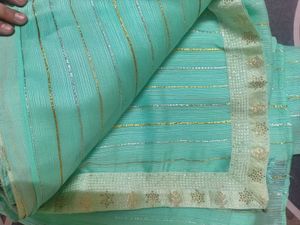 Beautiful Teal Saree with Gold Stripes