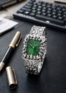 Silver Tone Watch with Intricate Design