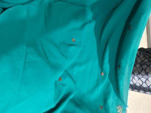 Elegant Teal Embroidered Saree unused