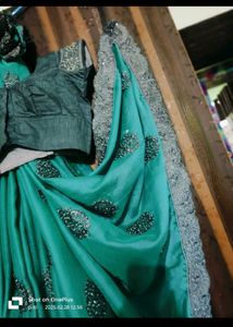 Elegant Teal Saree with Embellished Blouse