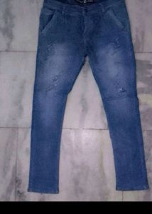 Distressed Blue Denim Jeans