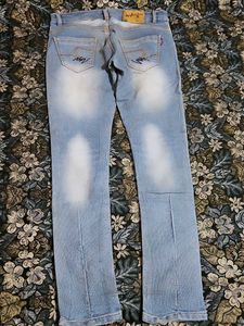 Light Wash Distressed Denim Jeans