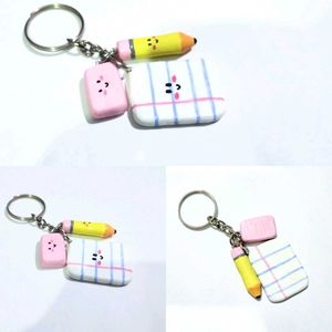 A tiny notebook, pencil and eraser Key chain 📚✏️