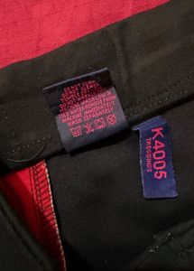 Black Jegging Pants with Red Stripe