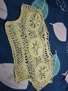 It is a yellow shrug.