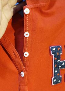 Tommy Hilfiger Orange Polo TShirt