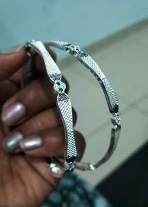 Elegant Silver Bangle with Red Stones