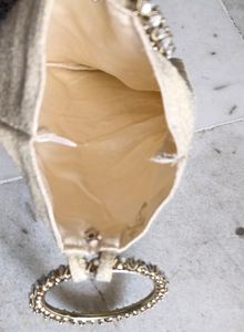Cream Coloured Jacquard Wrist Pouch