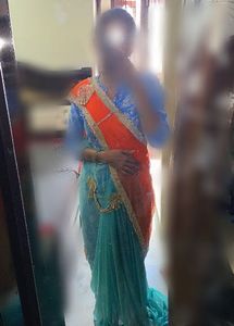 Stunning Blue and orange Net saree with Embellishm