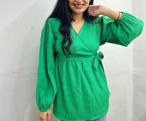 green puff sleeve top