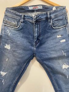 Distressed Denim Jeans