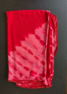 Stunning red tie-dye saree with unique embellishme