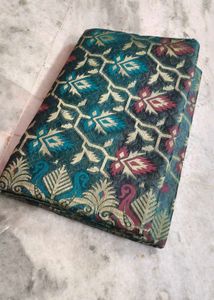 Elegant Teal Floral Brocade Saree