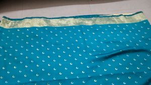 Beautiful Teal Saree with Pink Border