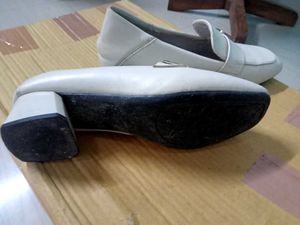 Stylish White Loafers with Buckle Accent